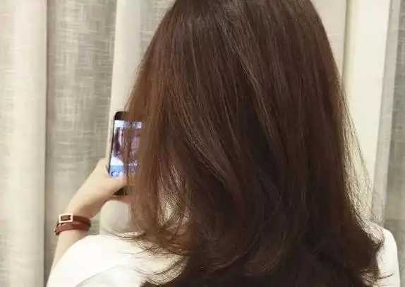 护发精油好还是弹力素好