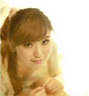 长脸适合高扎蓬松卷发马尾吗？分享适合长脸女士的9款发型